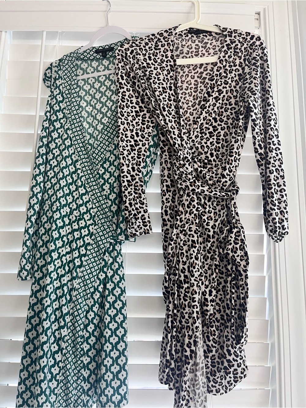 Two banana republic wrap dresses - green and white geometric and leopard.